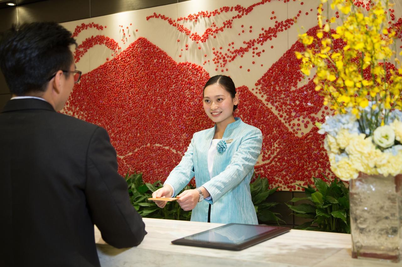 Yiwu Zhong Lian Kai Xin Hotel Exterior photo